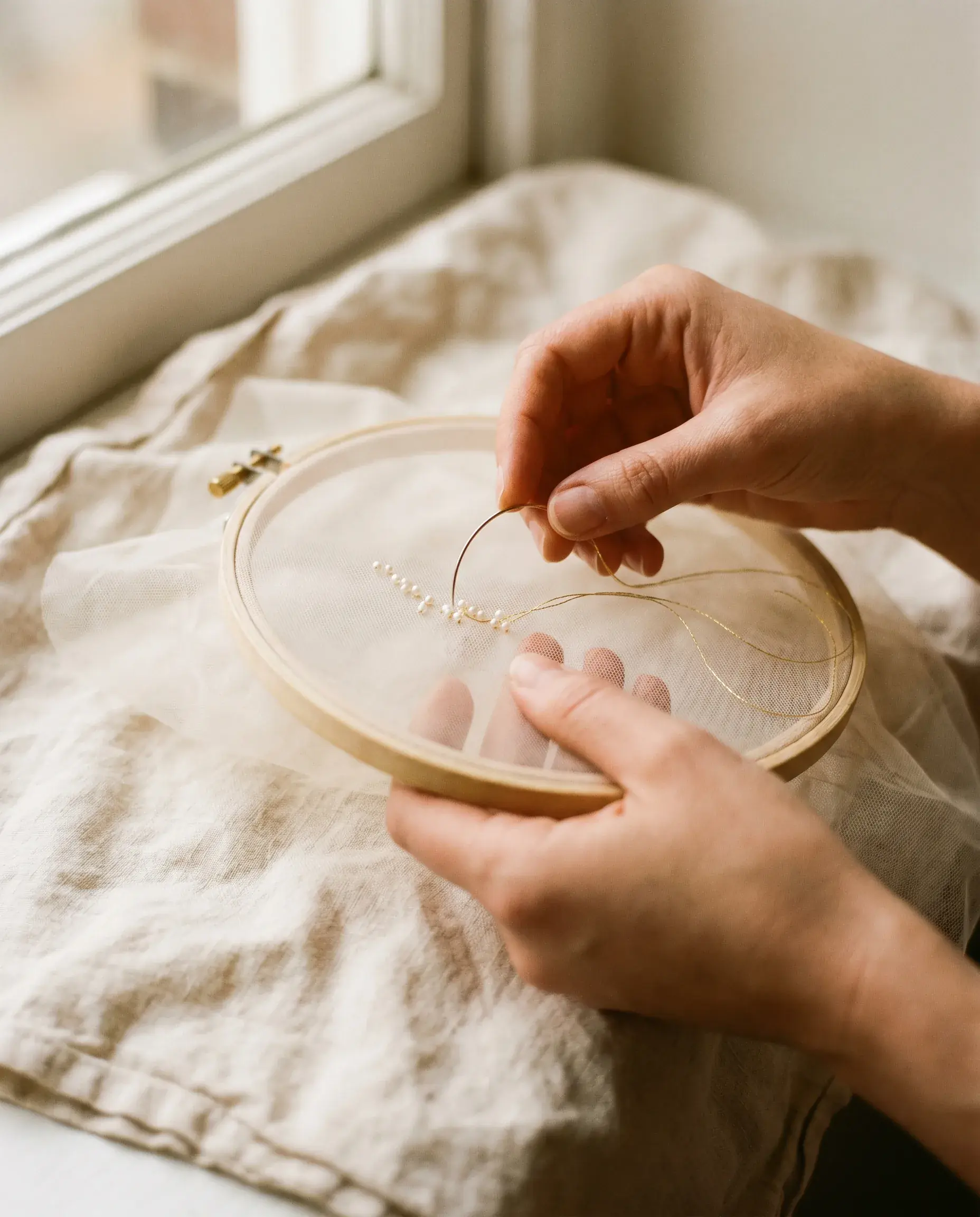 Hand-embroidery at the Maison Rima atelier